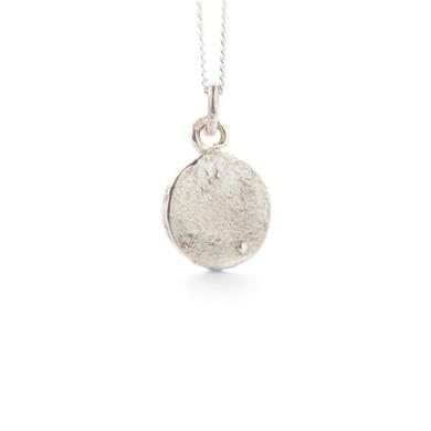 Pendentif rond et brut en argent